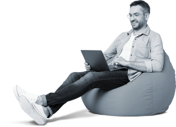 man sitting with laptop photo