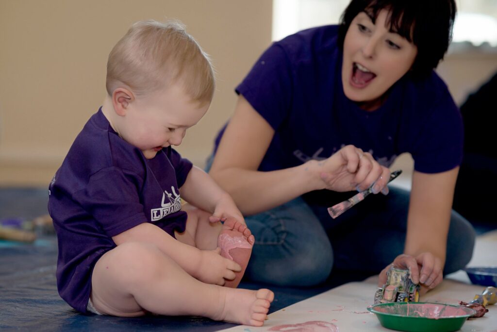 Little Learners UK baby playing in class Little Learners UK baby playing in class