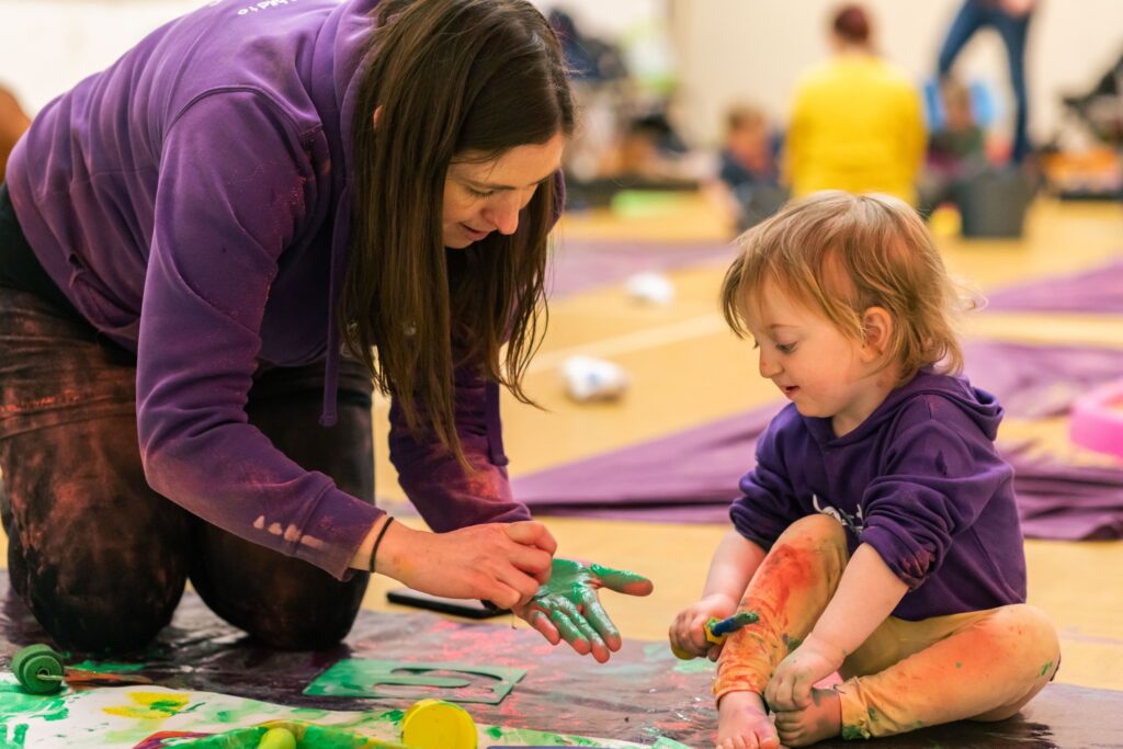 Little Learners UK messy play kid and teacher