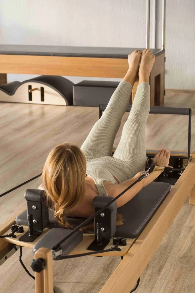 woman training Pilates