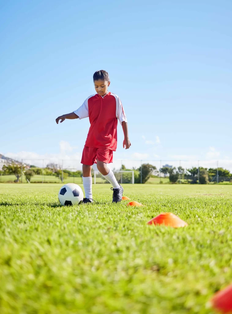 football-girl-kid-grass-and-training