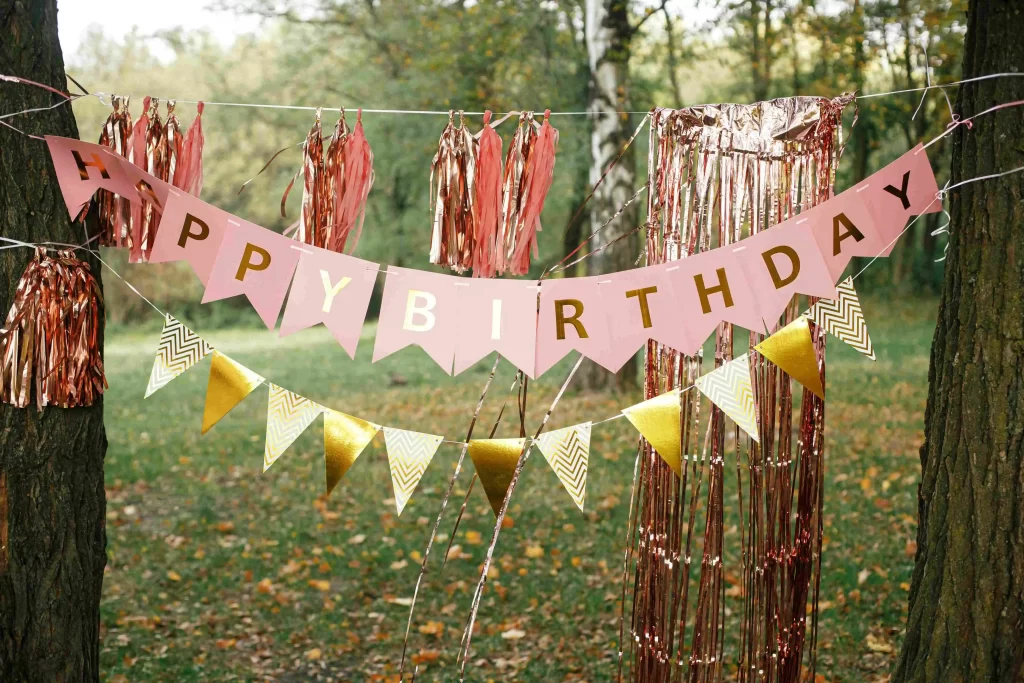 stylish-birthday-garland-hanging-in-park-modern stylish-birthday-garland-hanging-in-park-modern